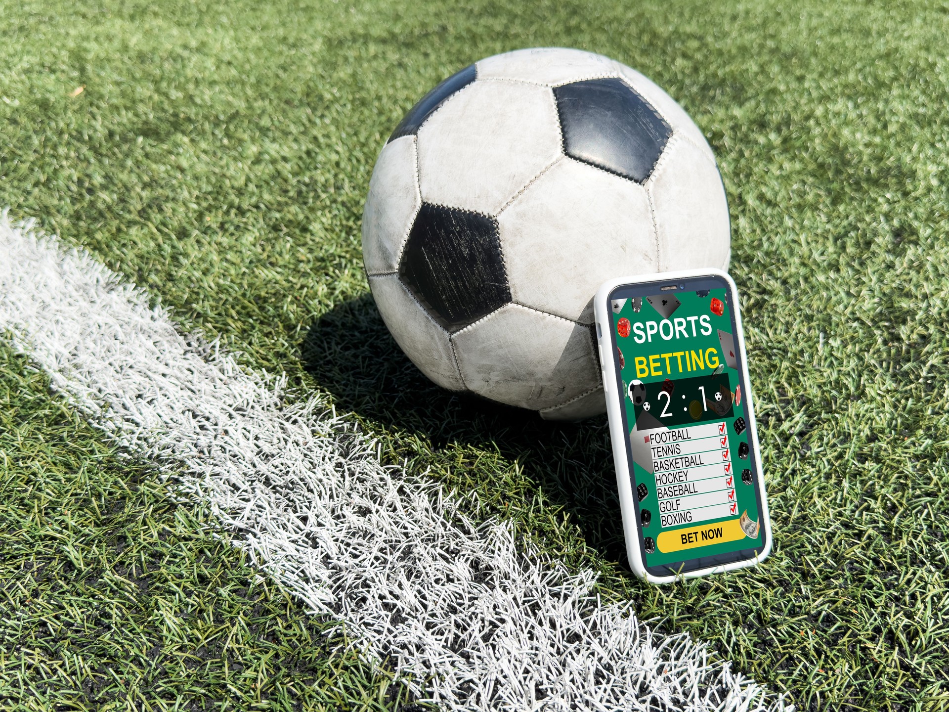 Live in-play betting app on smartphone display, soccer